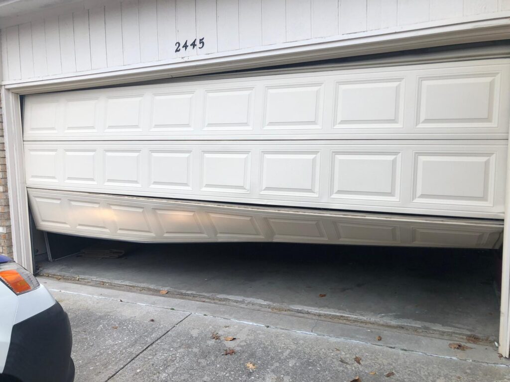 garage door off track near dallas tx repair by metro garage door repair 1024x768 1